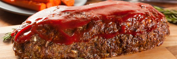 meatloaf with ketchup on table