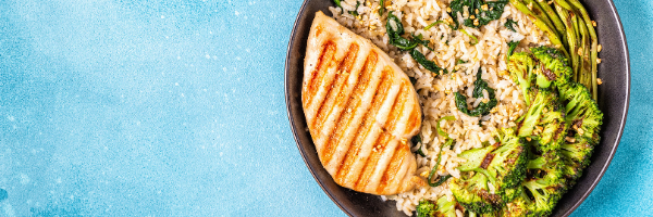 grilled chicken on plate with rice