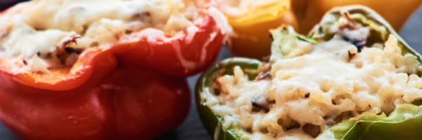 stuffed red and green pepper with cheese and meat