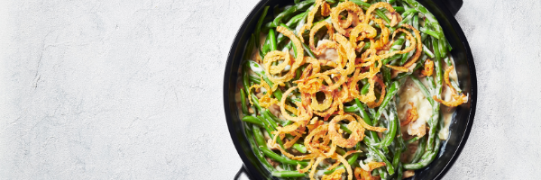 green bean casserole in black dish